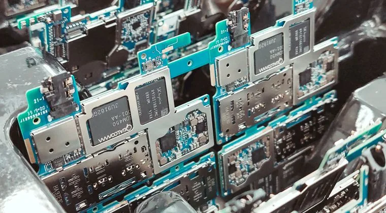 Close-up of intricate circuit boards in a Vietnamese factory, capturing modern electronics production